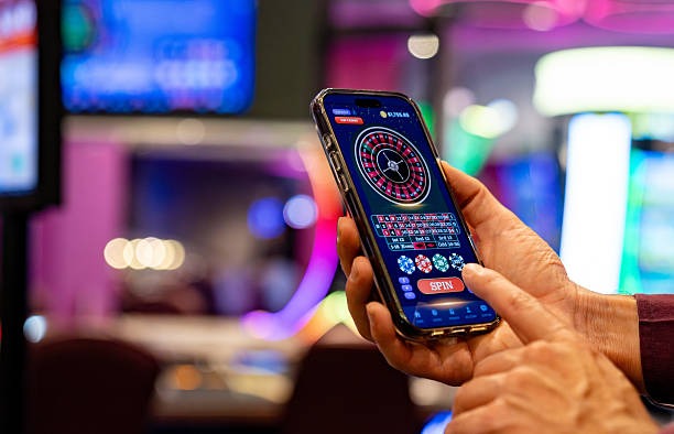 Multi-camera view of gotobet live blackjack studio showing dealer and card table